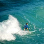 Take surf lessons in Hawaii with trained professionals.